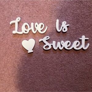 ‘Love Is Sweet' Wall Decor one is white and one is gold